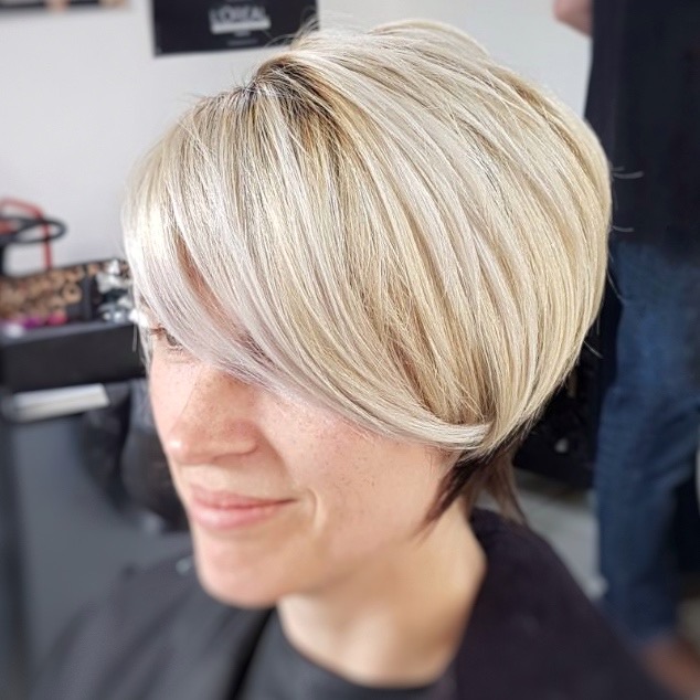 Ladies Short Blonde Haircut with Sweeping Fringe