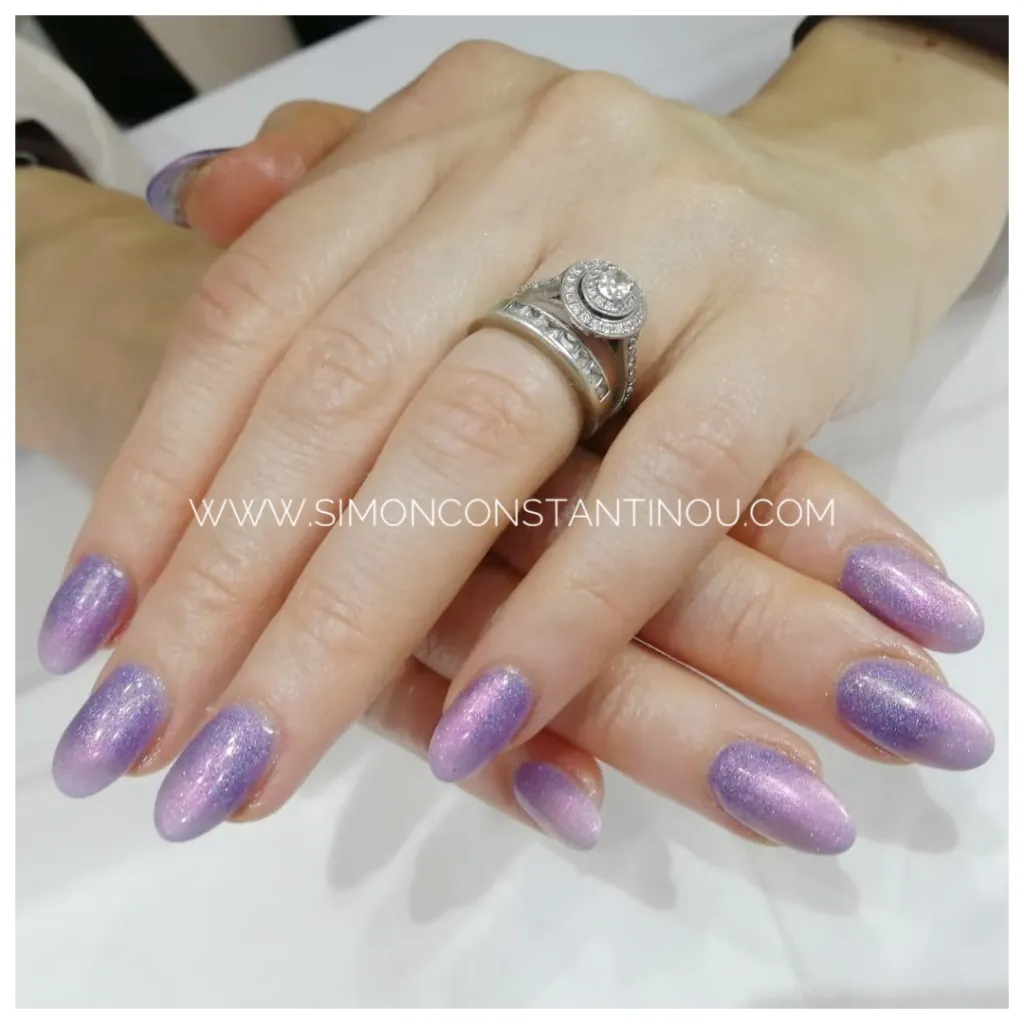 Purple acrylic nails hi-res stock photography and images - Alamy