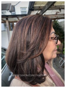 Subtle highlight on brunette hair by Mia at Simon Constantinou Hairdressers Cardiff