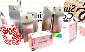 Christmas Window Display with Christmas Gift Sets at Simon Constantinou Hairdressers in Cardiff