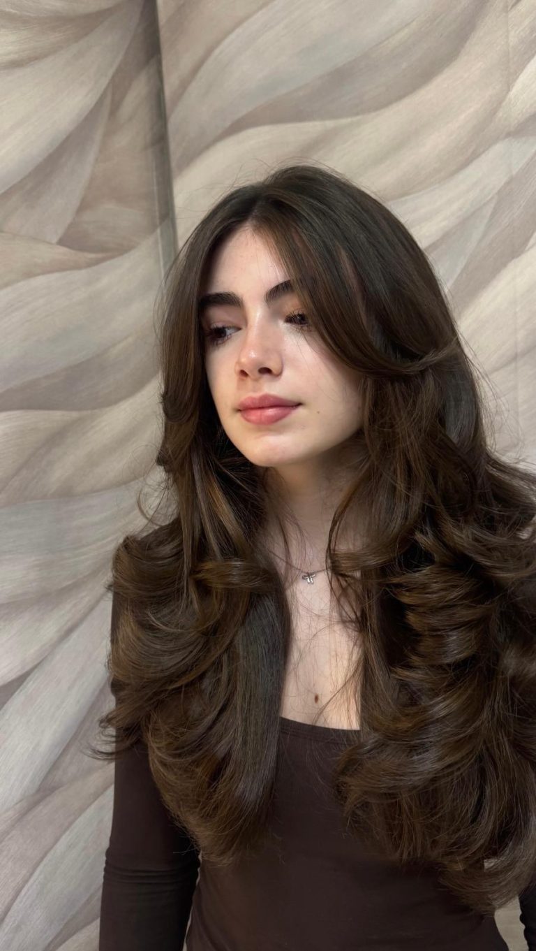 Layered long hair cut and bouncy Blow Dry by Leonie at Simon Constantinou Hairdressers Cardiff